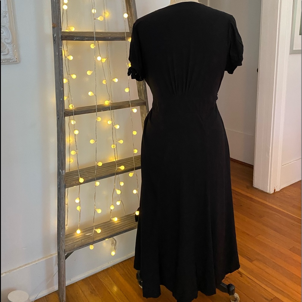 Beautiful Boho Midi Dress with Embroidered Floral Accents - Picture 4 of 12